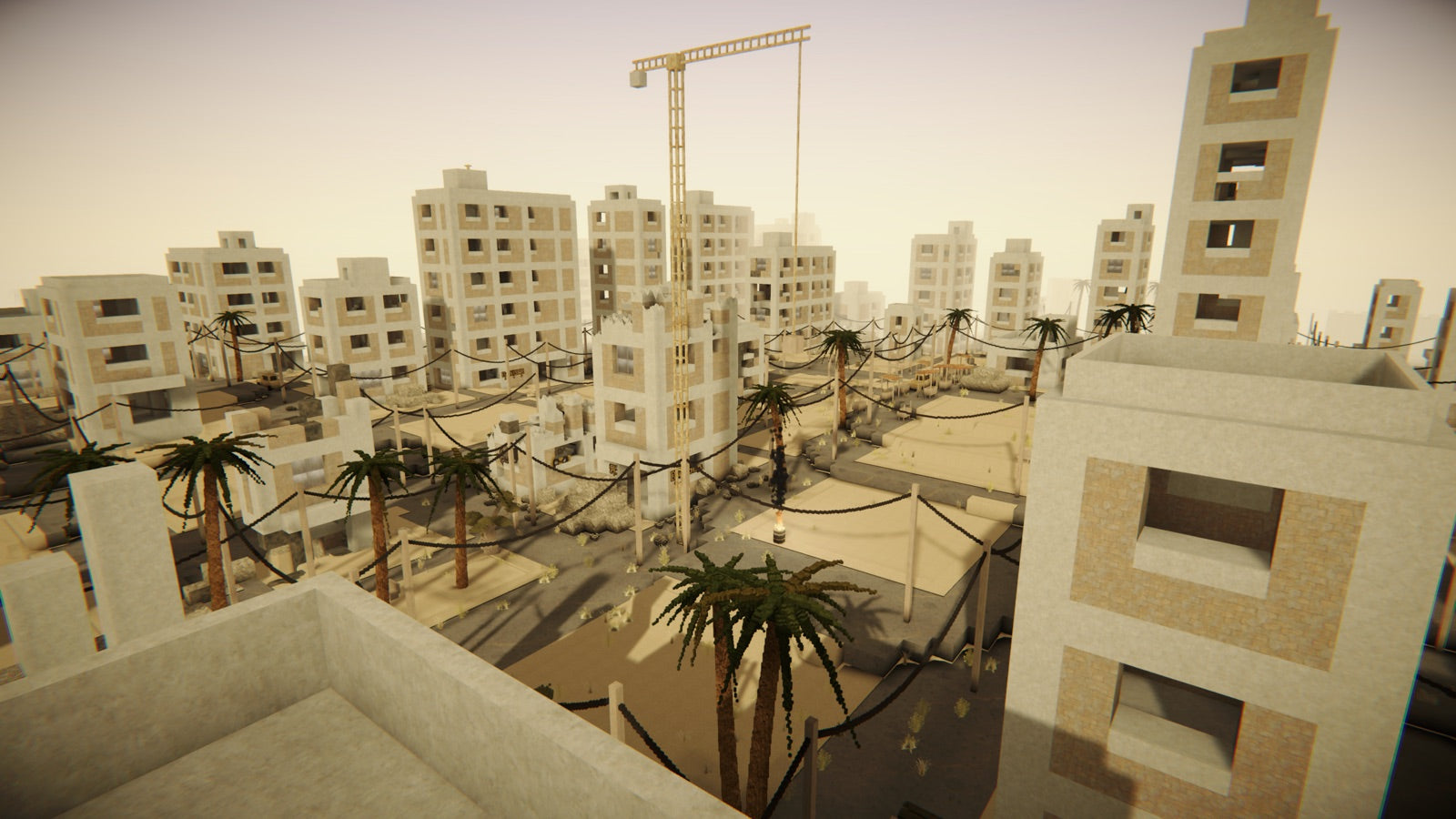 Aerial view of a war-torn voxel desert city with tower crane and palm trees
